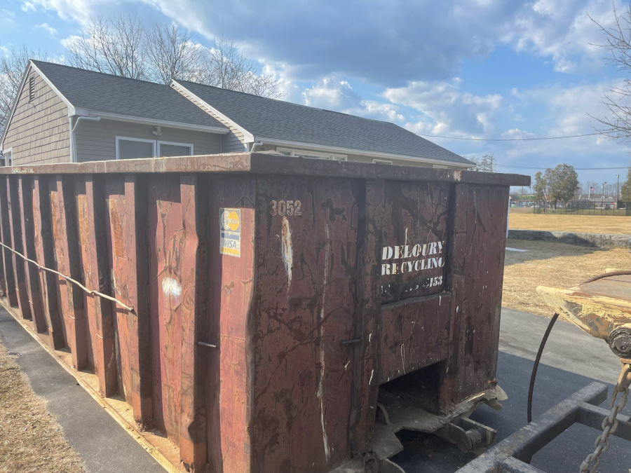 30 yard dumpster rental delivered in Lowell, MA for a basement clean out.