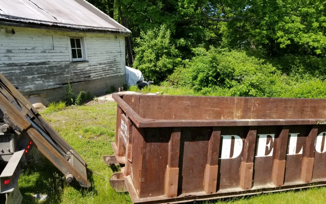 Customer order a 30 yard dumpster rental with a 4 ton max a shed tear down in Georgetown, MA.