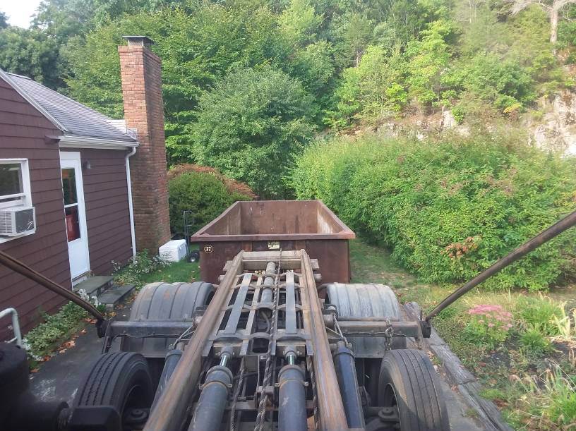 20 yard dumpster rental with a 3 ton max swapped out in Manchester MA. The contractor is doing a first floor interior renovation.