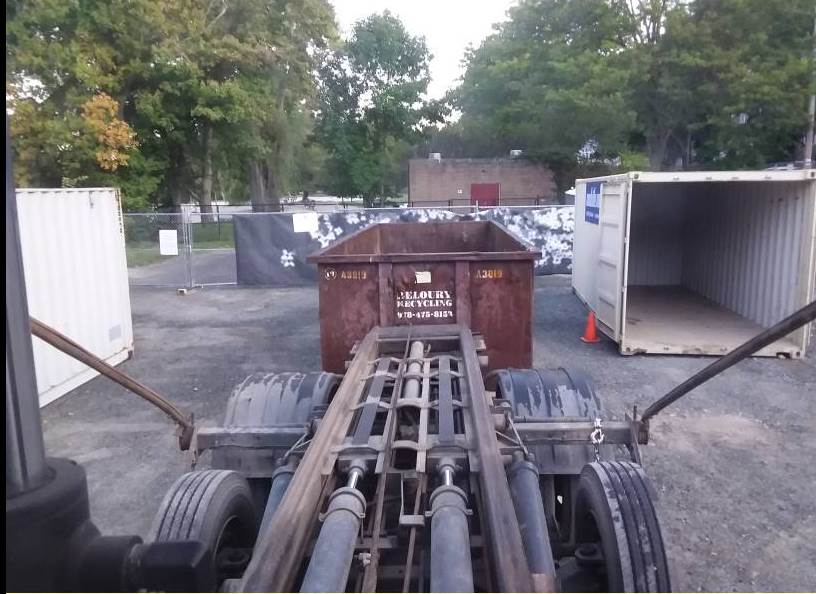A 30 yard dumpster rental with a 5 ton max delivered to Arlington for repairs at Elementary School playground and courts.