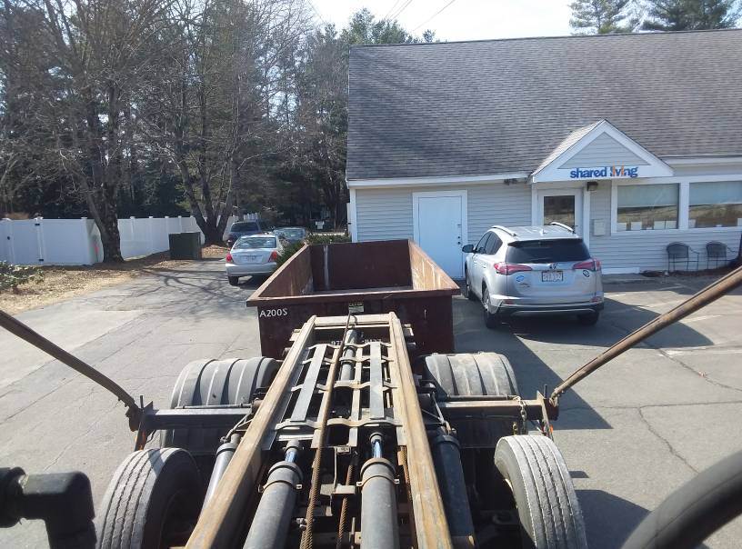 20 yard dumpster rental with a 3 ton max being used for apartment clean outs in Merrimac, MA.