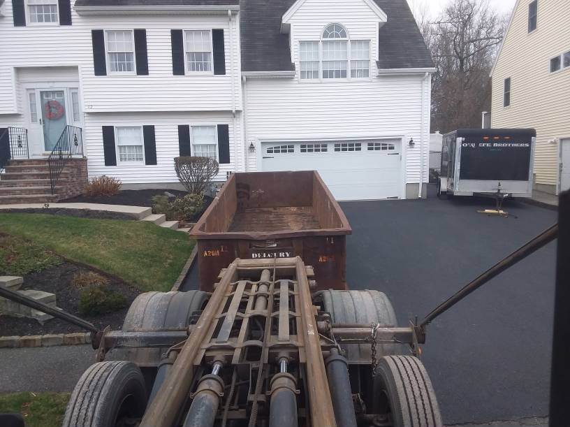 In Lynn MA, a 20 yard 4 ton dumpster used in a roofing project.